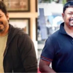 குடை பிடித்தவாறு தேசியக்கொடி ஏற்றிய கடற்றொழில் அமைச்சர்